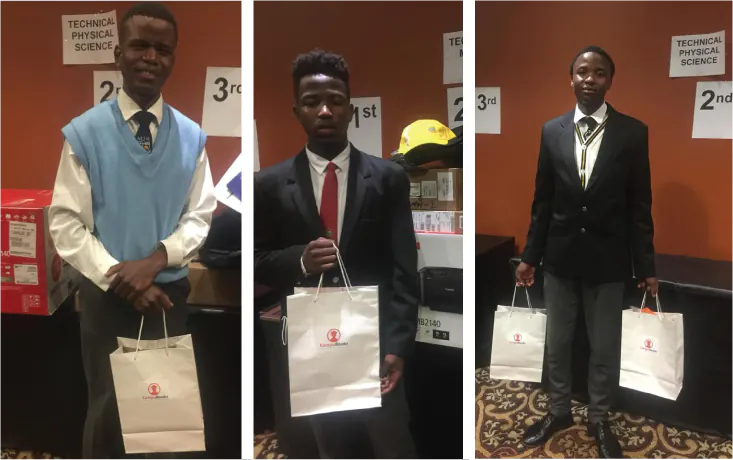 Learners receiving awards at a school prize-giving supported by Compubooks